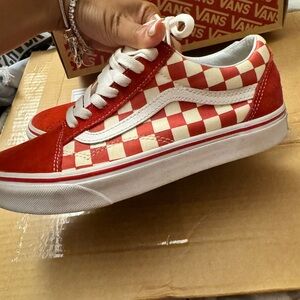 Red and white checkered vans. Size 7